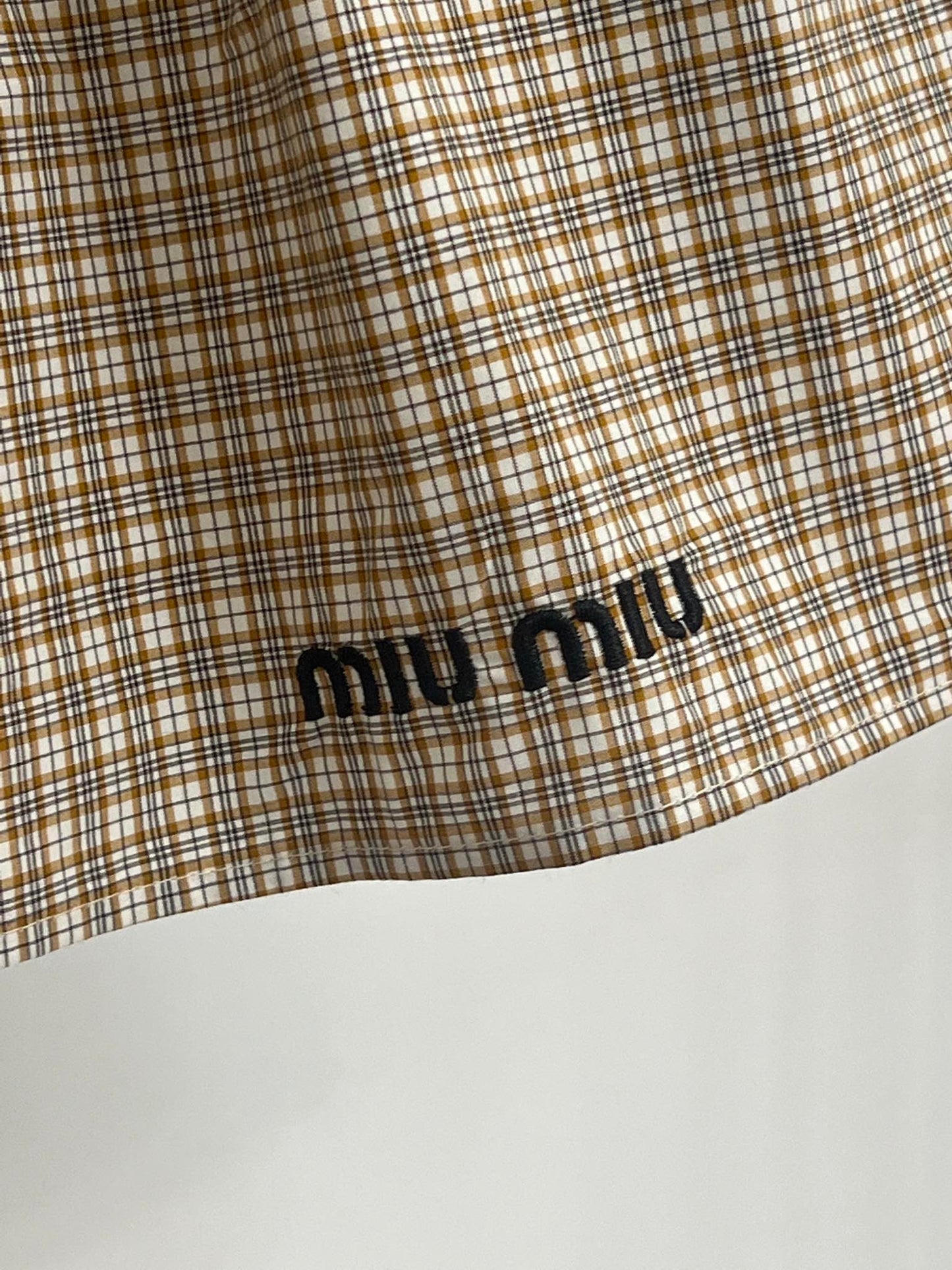 MM 25SS Elegant Plaid Mini Skirt – Timeless Appeal